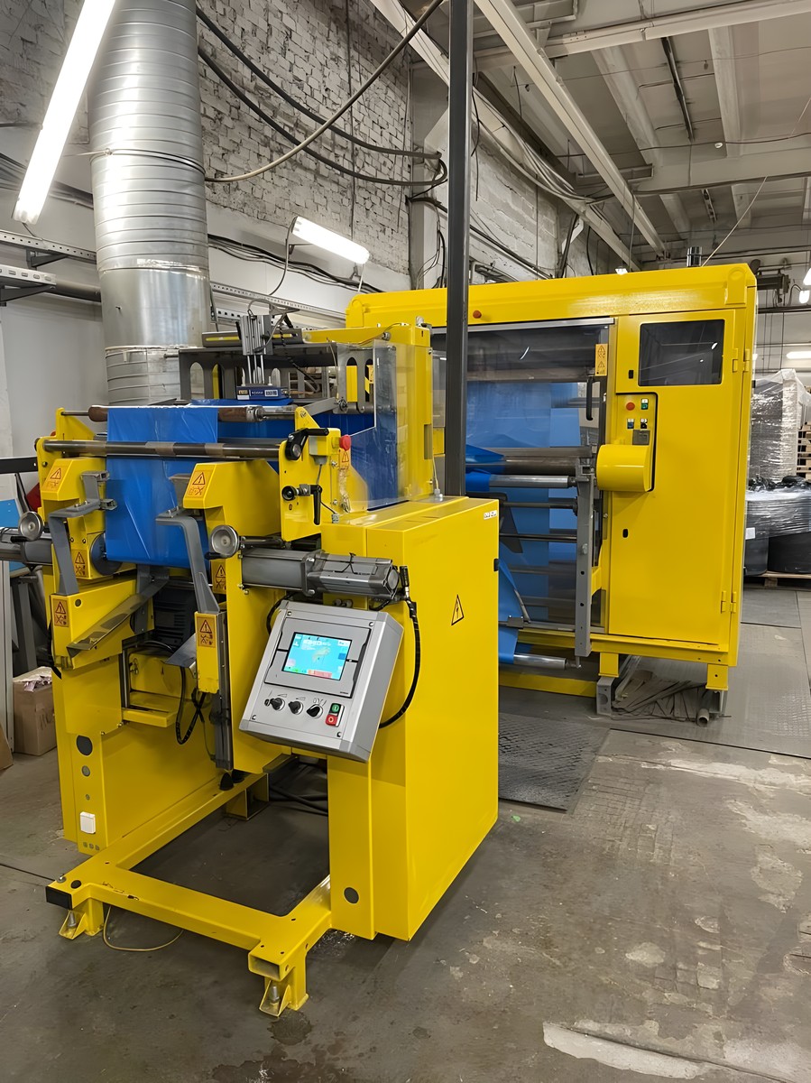 LEMO line: a yellow bag machine with a touch-screen control panel in the workshop